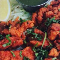 Amritsari Fish · a light batteredfish fry in Indian spices,ginger garlic paste and gram flour