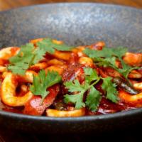 Hot Squid · Sliced squid, lotus root, shiitake mushroom, sautéed in a spicy red pepper sauce, topped wit...