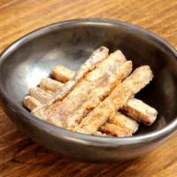 Gobo Sticks · Burdock root sticks sautéed in sesame oil and flash fried.