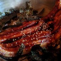 Unagi Don · Delicately broiled all-natural whole eel fillet drizzled with a robust, sweet eel sauce, top...