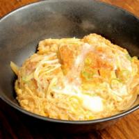 Katsu Don · Panko breaded pork cutlet, onions, scallions, and soft-cooked cage-free eggs simmered in a r...