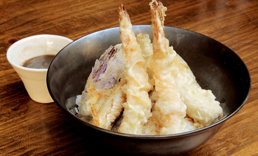 Shrimp & Anago Ten Don · Deep fried airy and crispy shrimp, conger eel, kabocha, broccoli, and eggplant tempura served over rice with our original savory tentsuyu sauce.