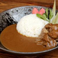 Beef Curry · Curry-spiced, tender stewed beef served with an all-vegetable broth savory curry.