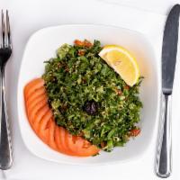 Tabbouleh · Cracked wheat with mixed parsley, green and red bell pepper, scallions and tomatoes tossed w...