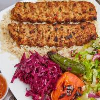 Chicken Adana Kebab · Hand Chopped Chicken seasoned with turkish spicies and served with rice and vegetables