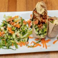 Chicken Shawarma Wrap · Favorite. Seasoned and marinated thinly slices of chicken with lettuce, tomato and red onion...