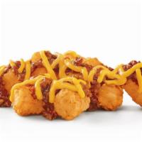 Chili Cheese Tots · Pop some of these crispy little potato pieces in your mouth and you'll never think of a spud...