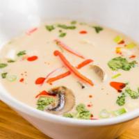 Tom Kha Kai · Mushroom and chicken in galanga coconut soup.