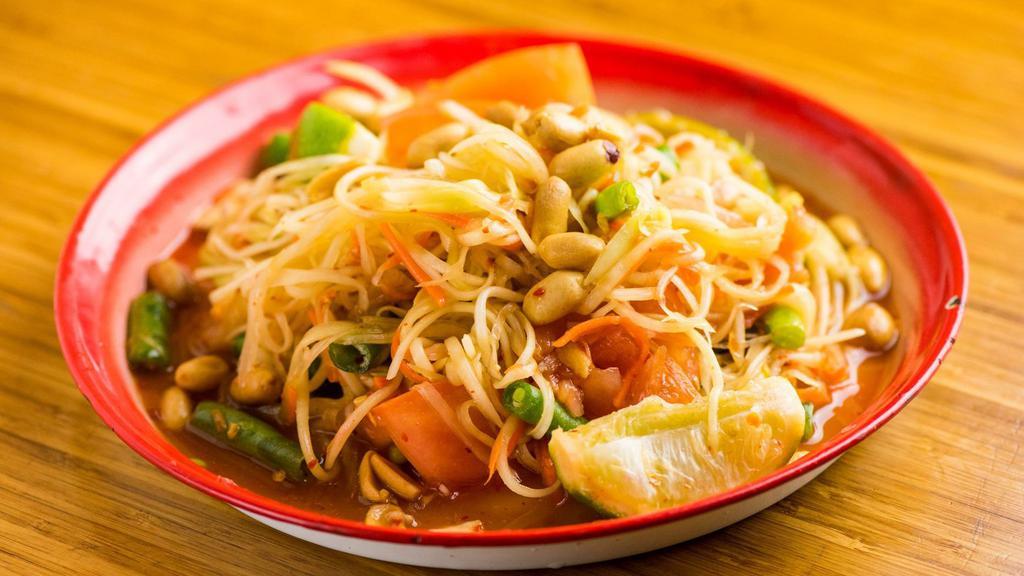 Tum Thai · Original style Thai spicy papaya salad w/ peanut, fish sauce, coconut sugar, garlic, Thai chili and dried shrimp.