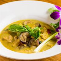 Green Curry · Bell peppers, Thai eggplant, bamboo shoot, string bean, basil leaves in green curry sauce, s...