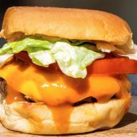 Double Cheese Burger · Two slices of Cheddar Cheese, Two 100% Angus Beef Patty, Tomato, Onion & Jalapeno Pickle, le...