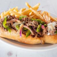 Steak Philly · Thinly sliced steak stacked high on a toasted hoagie roll with peppers and onions and melted...
