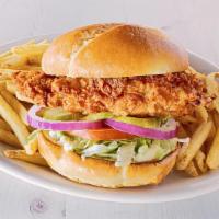 Buttermilk Crispy Chicken Sandwich · Buttermilk soaked, hand-breaded chicken breast is fried to perfection, topped with lettuce, ...