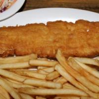 Yuengling Beer-Battered Fish And Chips · A generous portion of lightly fried haddock filet is served alongside natural-cut fries, cla...