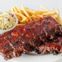 Hurricane Ribs - Full Rack · Smoked baby back ribs served with your choice of BBQ sauce. Served with two classic sides.  ...