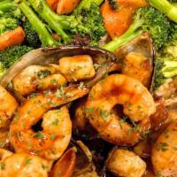 Seafood Combo · 5 grilled mussels, 5pc grilled shrimps, 5 grilled scallops in our seafood sauce (teriyaki & ...