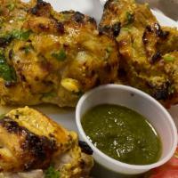 Chicken Tangari · chicken legs marinated with SAFRON and authentic Indian spices cook to perfection in clay ov...