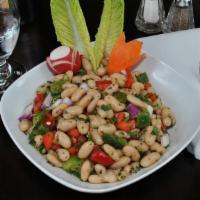White Bean Salad · White beans, tomatoes, red onions, parsley and peppers. Served with house dressing.