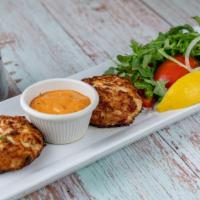 Crab Cakes · Crab meat, eggs, mustard and seasonings. Served with mixed greens.