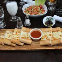  Cheese Pide · Flatbread topped with mozzarella cheese.