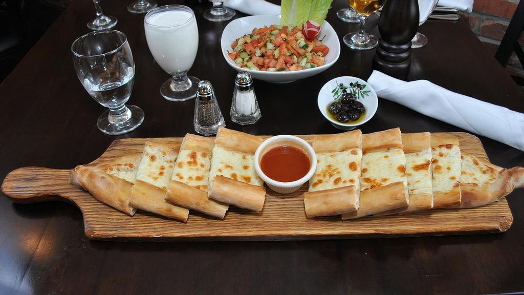  Cheese Pide · Flatbread topped with mozzarella cheese.