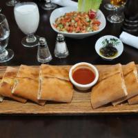  Potato Pide · Flatbread stuffed with potatoes and herbs.
