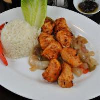 Chicken Shish · Favorite. Char-grilled cubes of marinated chicken breast. Served with rice pilaf and garnish.