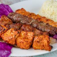Mixed Grill · Combination of lamb shish, chicken shish, adana kebab and chicken adana. Served with rice pi...