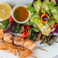 Grilled Salmon · North Atlantic salmon moist and juicy. Served with green salad.