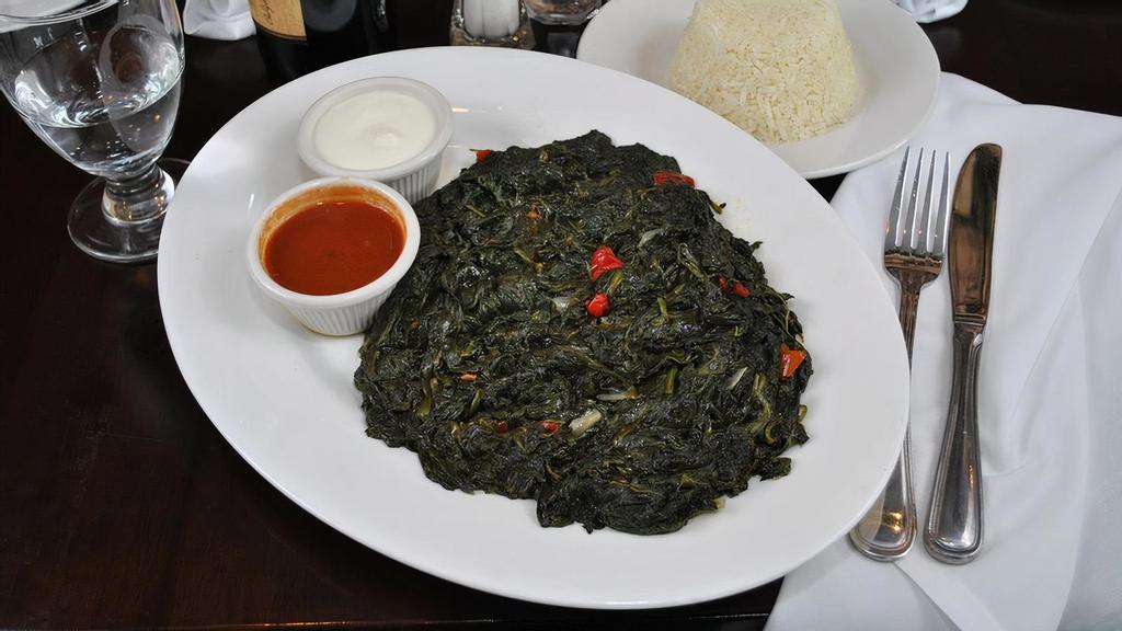 Spinach Sautéed · Spinach leaves sautéed with rice, red peppers and onions. Served with rice.