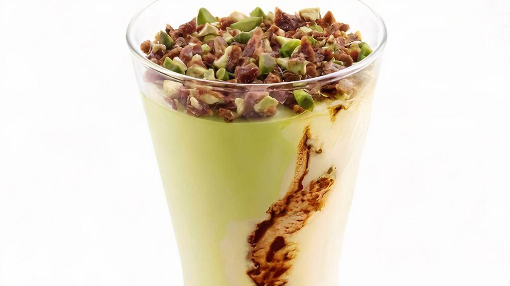 Pistachio Gelato · Custard gelato swirled together with chocolate and pistachio topped with praline pistachios.