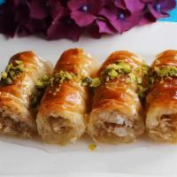 Baklava · Buttered dough layers filled with pistachios.
