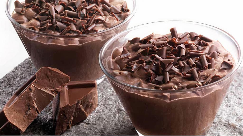 Chocolate Mousse · Rich chocolate mousse with chocolate curls.