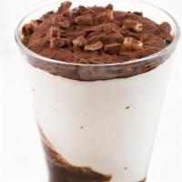 Chocolate Chip Gelato · Custard gelato swirls with chocolate and chocolate syrup.