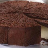 Chocolate Ganache Cheesecake · Cheesecake topped with layer of chocolate ganache.