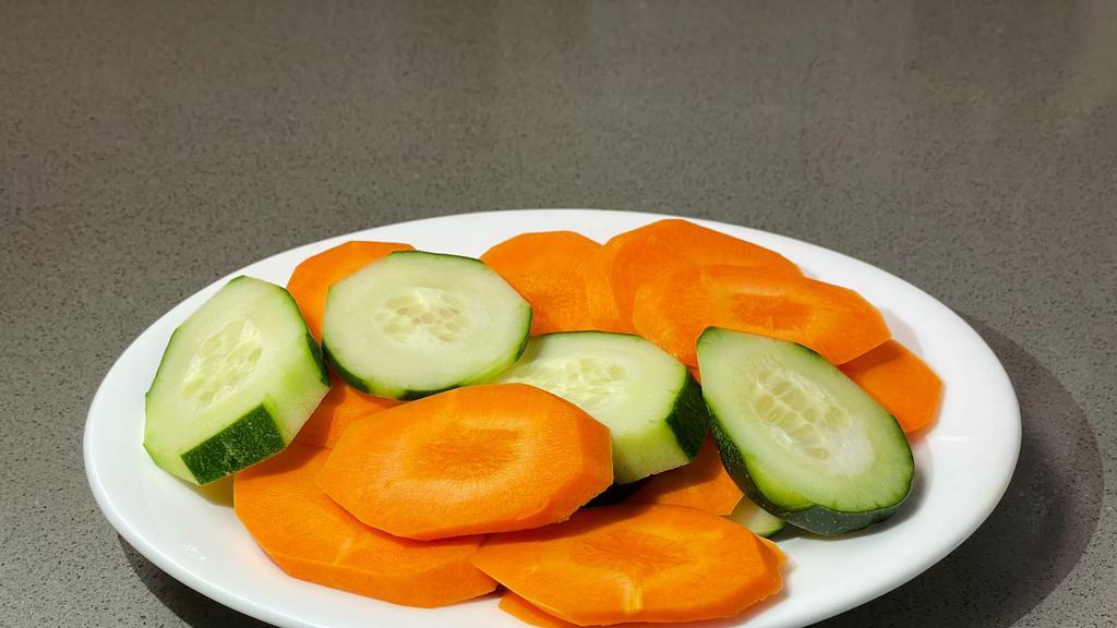 Sliced Carrots And Cucumbers · Sliced Carrots and Cucumbers.