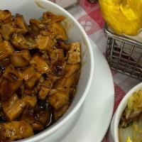 Bourbon Chicken /  Pollo Borracho · With your choice of rice and beans.