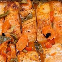 Grilled Salmon / Filete De Salmon · 8oz Salmon wedge grilled to perfection.