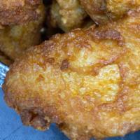 Fried Chicken Wings / Alas De Pollo Frita · 8 Battered and Fried crispy and hot wingettes.