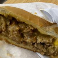 Philly Cheesesteak Sandwich · American cheese and onions.