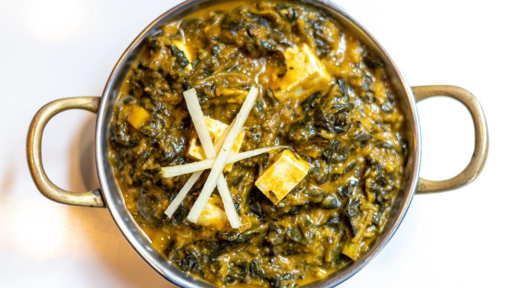 Saag Paneer · Spinach with farmer's cheese, garlic, and ginger. Server with basmati rice. Vegetarian.
