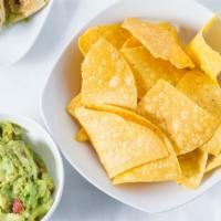 Guacamole & Chips · Avocado, tomato, red onion, cilantro and fresh lime served with homemade tortilla chips.
