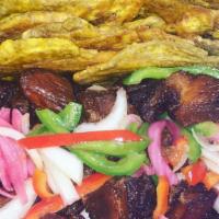 Griot · Tender cubes of pork, seasoned with a blend of creole spices and fried to perfection served ...