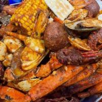 Seafood Platter Small · Snow crab, whole shrimp, crawfish, mussels, clams, corn and potatoes. Not sold by the pound,...
