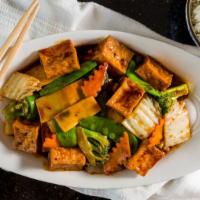 Tofu Family Style · Lightly fried tofu with vegetables in spicy brown sauce.