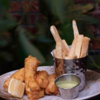 Fish And Chips · Served with Yucca Fries and Chimichurri Sauce.