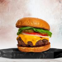 Cheese And Chong'S Next Burger · American beef patty topped with melted cheese, buttered lettuce, tomato, onion, and pickles....