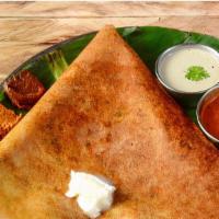 Butter Sada Dosai · Buttery, rice & lentil crepes, served with sambar, coconut & tomato chutney.