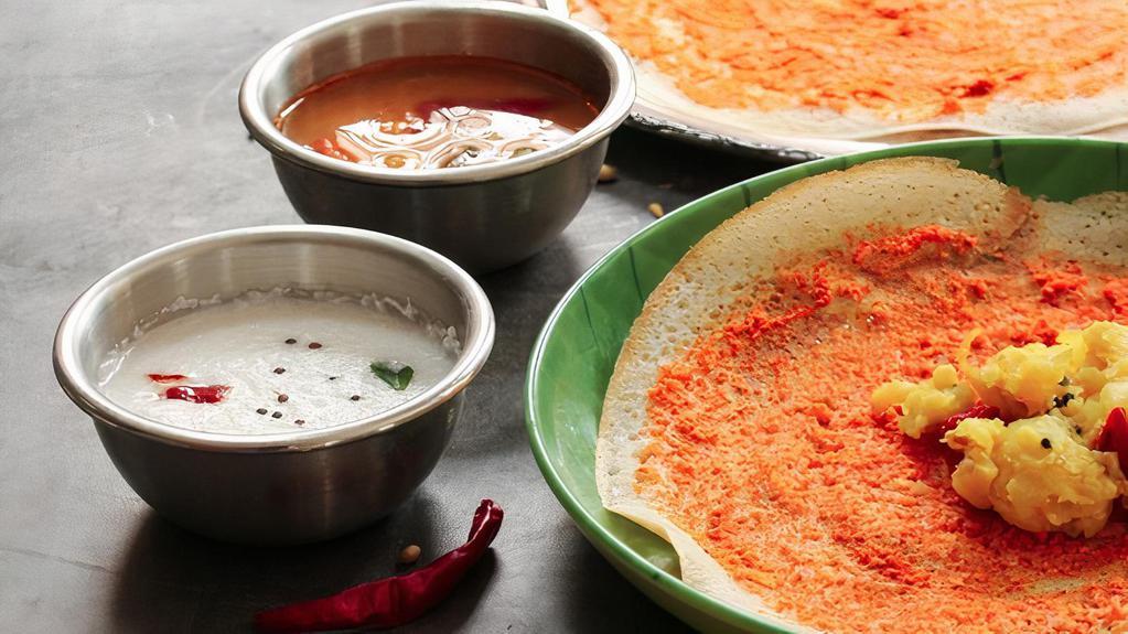 Cheese Sada Dosai · Spiced rice & lentil crepes, served with sambar, coconut & tomato chutney.