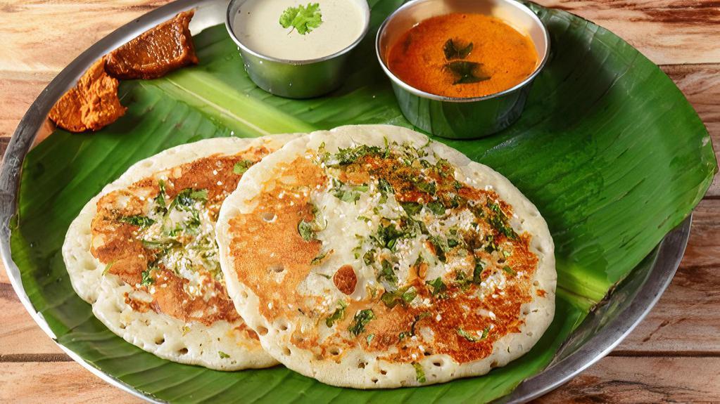 Spinach Dosai · Rice and lentil crepe topped with spinach garlic paste. Nutritional twist for a balanced diet.